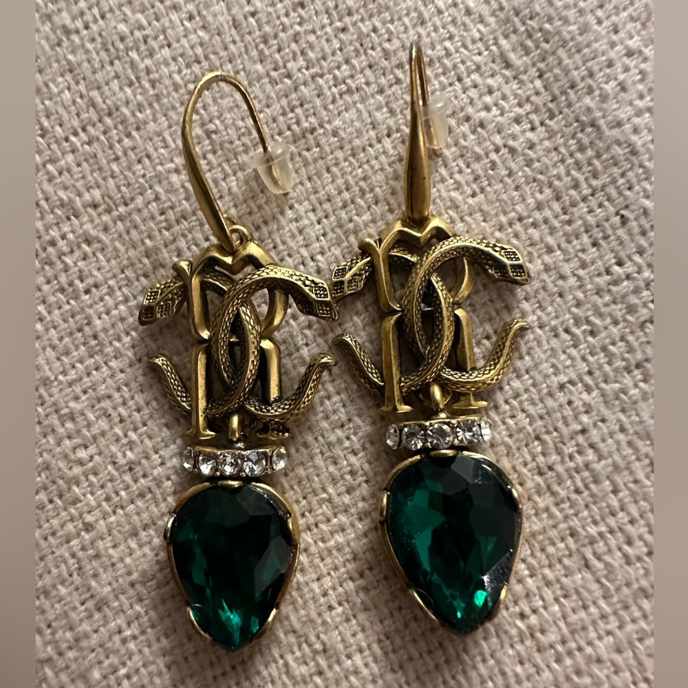 Roberto Cavalli Brass Snake Earrings with a green gem and rhinestones